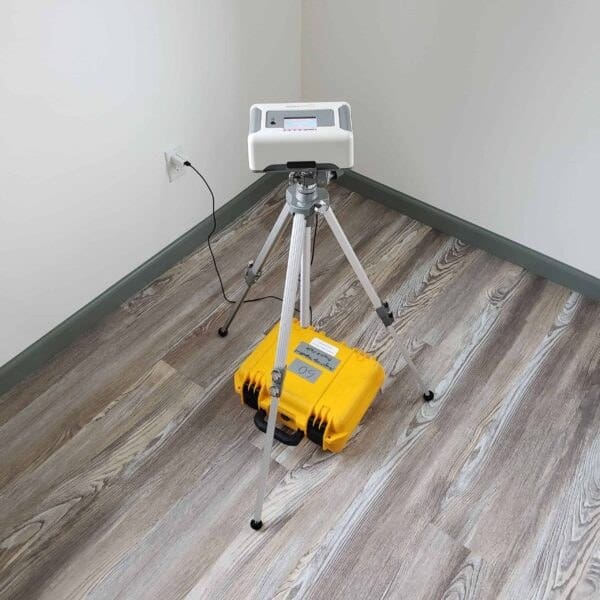Continuous radon monitor set up on a tripod for a 48-hour radon test in a Durango, Colorado home
